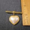 Very pretty vintage Monet dangling heart faux pearl two-piece bar brooch medal