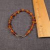 Pretty real amber chips and orange stone carnelian? bracelet sterling clasp 7.75