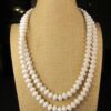 Beautiful long vintage Crown Trifari white beaded necklace 45"