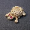 Cute gold-tone Toad or Frog solid perfume container red eyes opens like locket