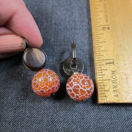 Gorgeous high quality earrings marked Nature wood w/orange crackled glass