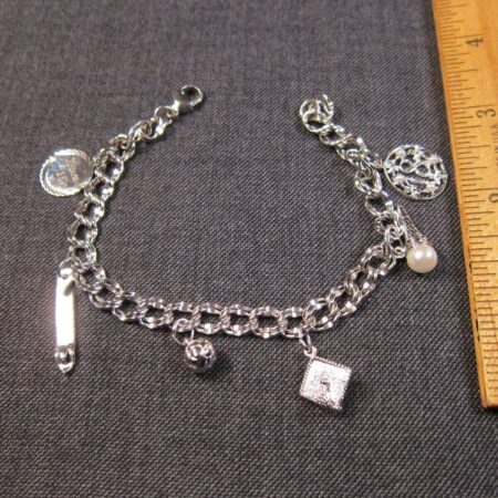 Beautiful vintage Prochain sterling silver charm bracelet 8" 6 charms 17.5g