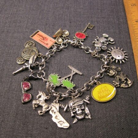Cute 7" long Disney charm bracelet full of lots of charms!