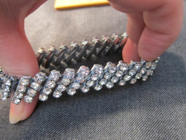 Neat stretchy flex silver tone metal bracelet covered in white rhinestones! - Image 6
