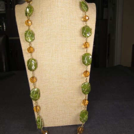 Gorgeous 36-38" long Joan Rivers gold-tone wire wrapped green acrylic necklace