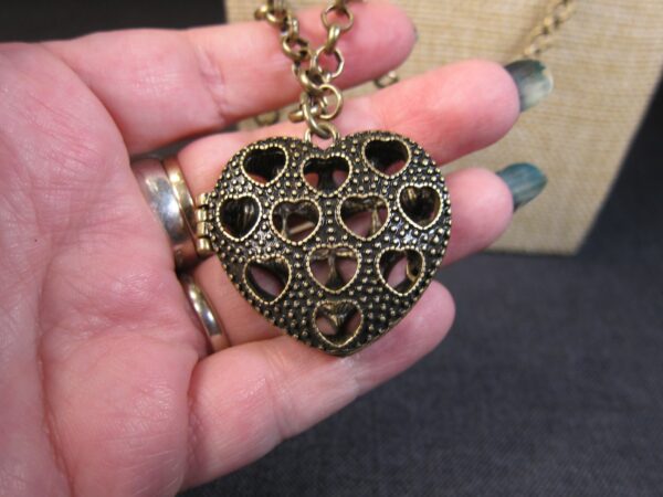 Gorgeous brass-tone openwork heart locket necklace by Lane Bryant opens hinged - Image 3