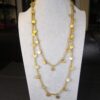 Beautiful 53" gold-tone chain & dangle medallions necklace vintage Barbara Boz