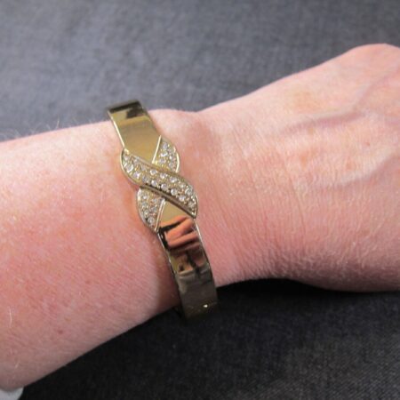 Gorgeous gold tone clamper hinged cuff bracelet w/white rhinestones X pattern