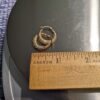 Beautiful 10K yellow gold .75" textured hoop pierced earrings 1.2 grams - Image 3