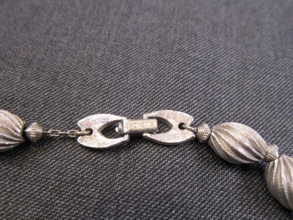 Gorgeous vintage Monet 24" textured silver-tone bead necklace strung on chain - Image 4