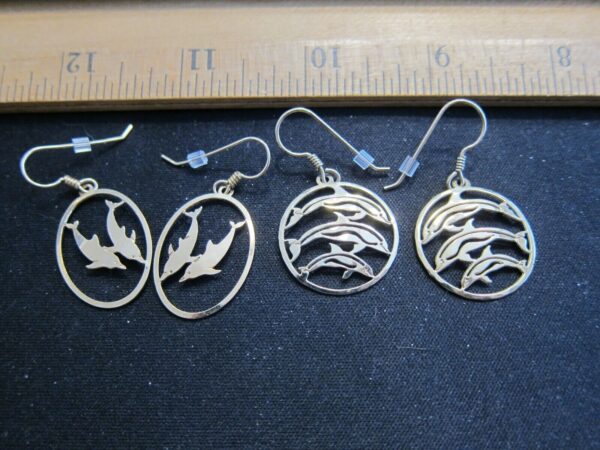2 different pairs of Wild Bryde dolphin earrings gold plated lightweight