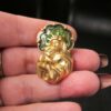 Beautiful green enamel matte gold-tone Mary Jesus brooch pin by Avon religious