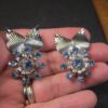 Gorgeous vintage Coro silver-tone clip-on earrings with blue rhinestones