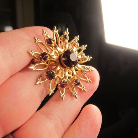 Gorgeous vintage Coro sunburst brooch pin w/purple glass rhinestones MINT