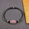 Beautiful purple/pink pave crystal bead rubber & sterling silver bracelet