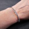 Gorgeous sterling silver pull-to-fit adjustable bracelet w/row of blue gemstones - Image 6
