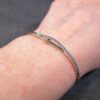 Gorgeous sterling silver pull-to-fit adjustable bracelet w/row of blue gemstones - Image 8