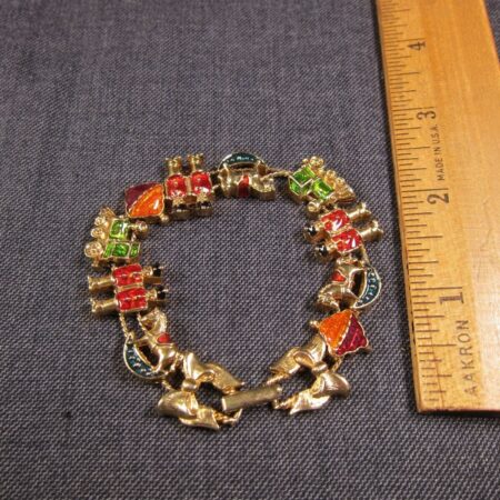 Very cute vintage chain slide charm bracelet Christmas theme enamel gold-tone