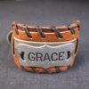 Thick Wide real leather bracelet browns w/word Grace on plaque across front