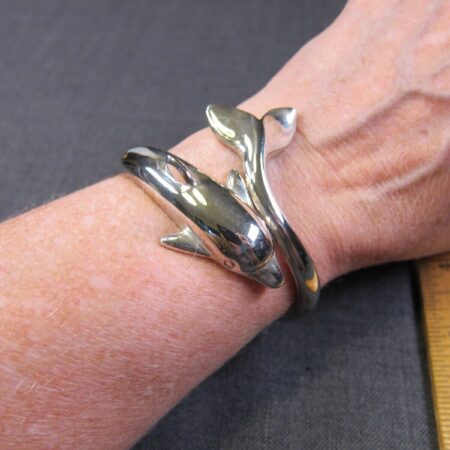 Gorgeous silver-tone hinged large dolphin bracelet