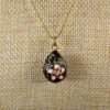 Gorgeous heavy black white red enamel egg pendant on 18" coppery gold tone chain