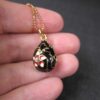Gorgeous heavy black white red enamel egg pendant on 18" coppery gold tone chain - Image 8
