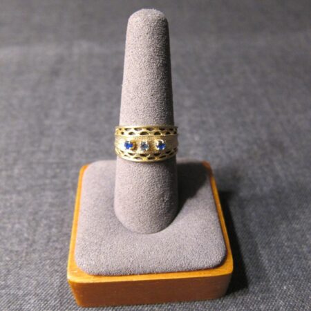 Beautiful wide lattice band ring with 3 blue rhinestones marked BW size 7