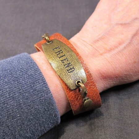 Beautiful Lenny & Eva leather bracelet with friend brassy sentiment