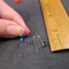 Gorgeous small .8g 14K white gold earrings with blue CZ stone - Image 3