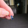 Gorgeous small .8g 14K white gold earrings with blue CZ stone - Image 4