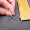 Gorgeous small .8g 14K white gold earrings with blue CZ stone - Image 5