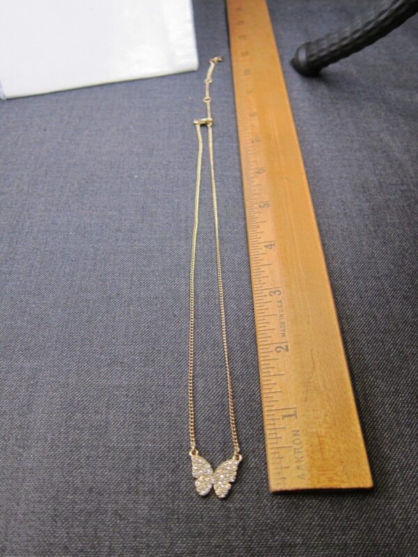 Very pretty gold-tone pave crystal DKNY butterfly necklace 16-19" long - Image 5