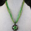Gorgeous multi-strand green cord necklace w/dichroic glass pendant 19-21"