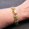 Beautiful vintage Y2K procession of elephants matte gold-tone bracelet 7.25"